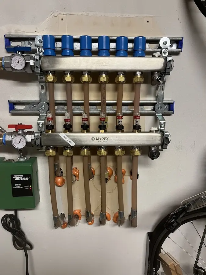 Plumber performing Water Heater Repair at a residential property in Bolivar